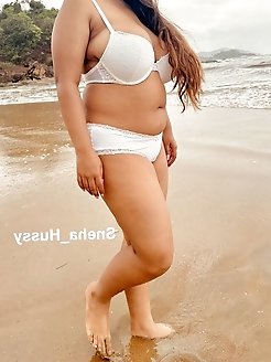 A sexy Korean woman is pleasuring herself.